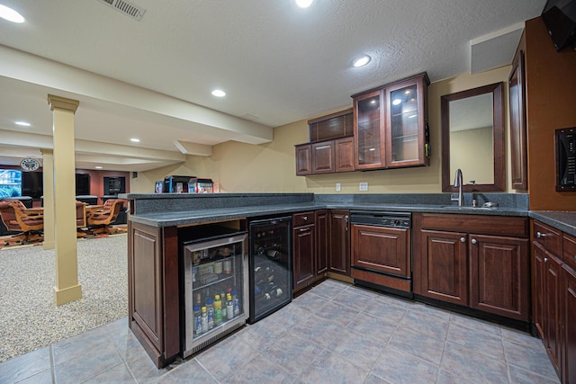 413 Ashmoore Cir E, Powell, OH 43065 - kitchen featuring wine cooler, a sink, dark countertops, and paneled dishwasher