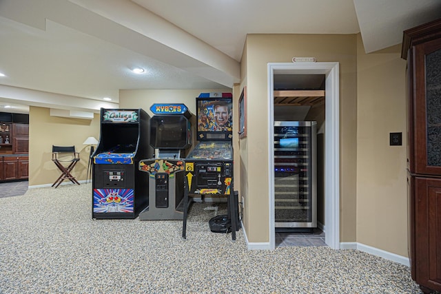 413 Ashmoore Cir E, Powell, OH 43065 - rec room featuring beverage cooler, recessed lighting, carpet flooring, and baseboards