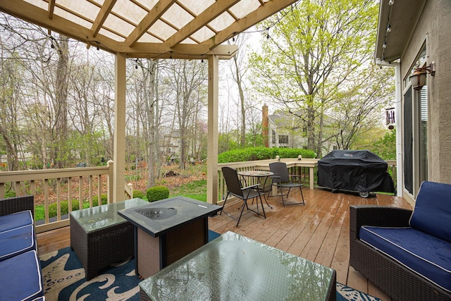 413 Ashmoore Cir E, Powell, OH 43065 - wooden deck with area for grilling, a pergola, and outdoor dining area
