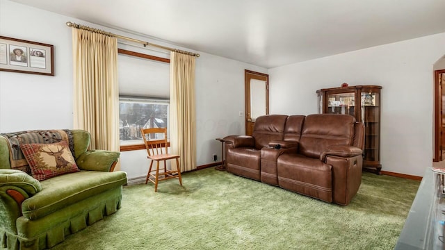 carpeted living room with baseboards