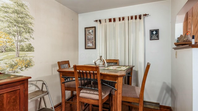 dining space with baseboards