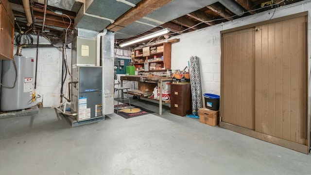 unfinished basement with heating unit and water heater