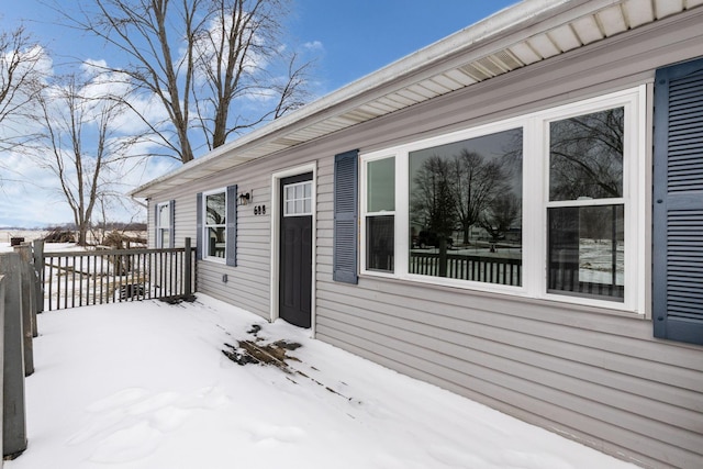 view of snow covered deck