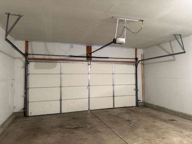 garage featuring baseboards