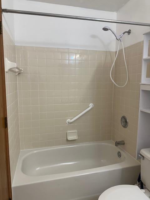 full bathroom with shower / bathing tub combination and toilet