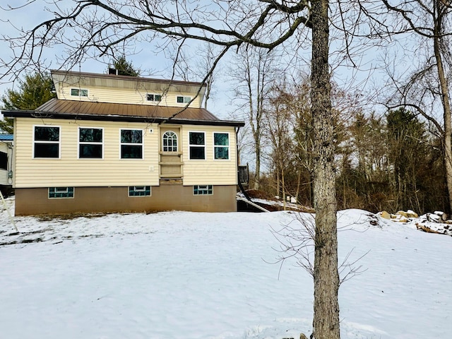 exterior space featuring metal roof