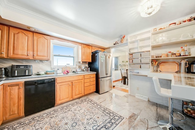 kitchen with black dishwasher, crown molding, light countertops, visible vents, and freestanding refrigerator