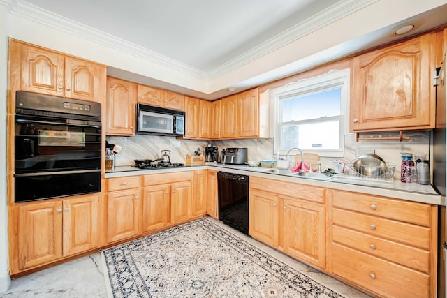 kitchen with ornamental molding, light countertops, black appliances, a sink, and a warming drawer