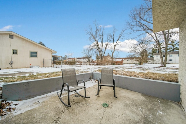 view of snow covered patio