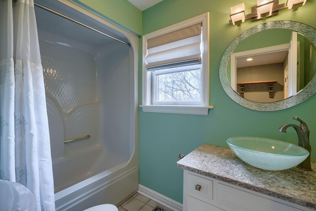 full bathroom featuring tile patterned flooring, baseboards, shower / tub combo with curtain, and vanity