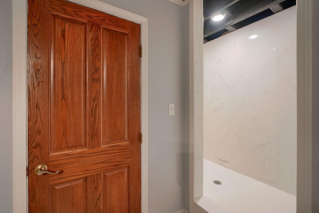 bathroom featuring a shower stall