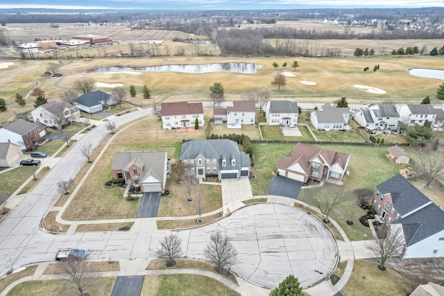 drone / aerial view with a residential view and a water view