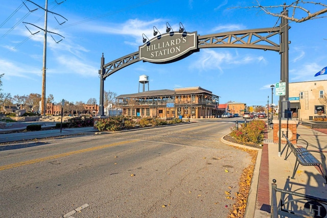 view of road with curbs and sidewalks