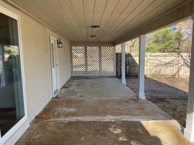 view of patio with fence