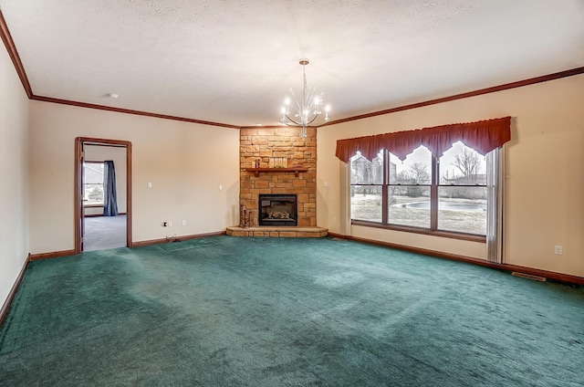 unfurnished living room with carpet floors, crown molding, a textured ceiling, a stone fireplace, and a chandelier