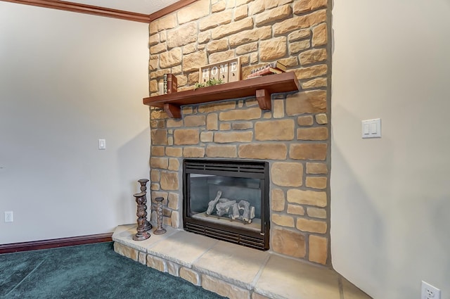 room details with crown molding, carpet, a fireplace, and baseboards