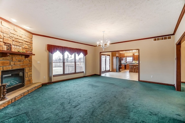 unfurnished living room featuring a fireplace, visible vents, a textured ceiling, and light colored carpet