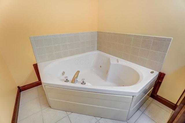 full bath with a bath and tile patterned floors