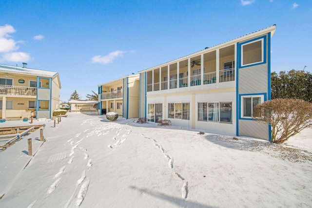 view of snow covered property