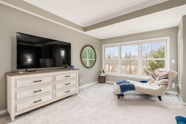 sitting room with ornamental molding, light colored carpet, and baseboards