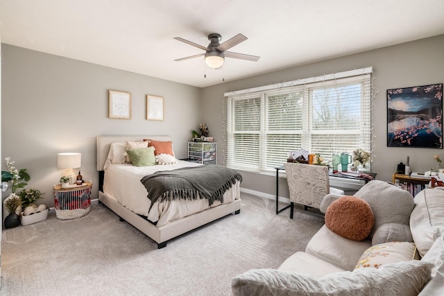 bedroom featuring carpet flooring, ceiling fan, and baseboards