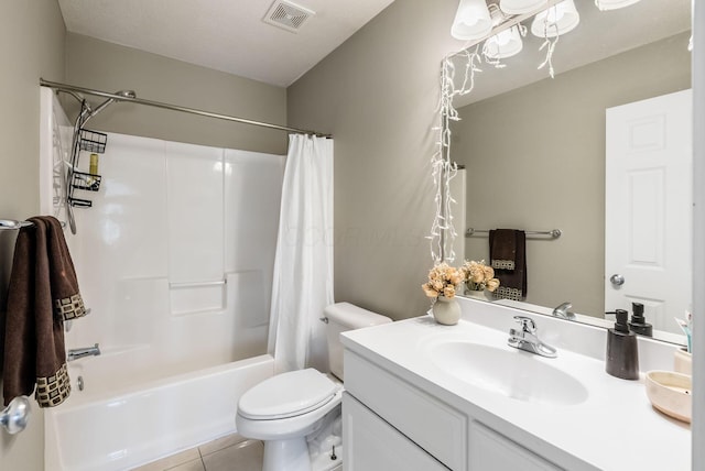 full bathroom featuring shower / tub combo with curtain, visible vents, toilet, vanity, and tile patterned floors