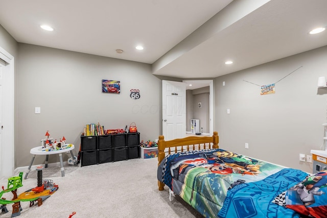 carpeted bedroom with recessed lighting