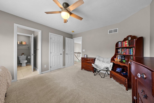 living area featuring carpet floors, a ceiling fan, baseboards, an upstairs landing, and visible vents