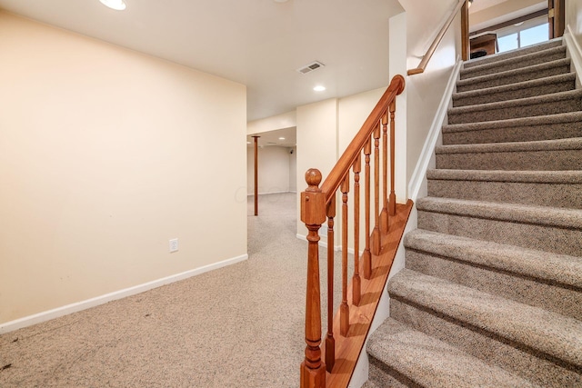 stairway featuring carpet floors, recessed lighting, visible vents, and baseboards