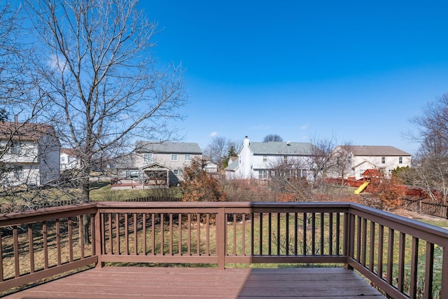 wooden deck with a residential view