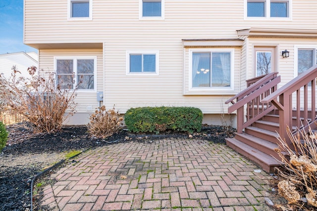 doorway to property featuring a patio area