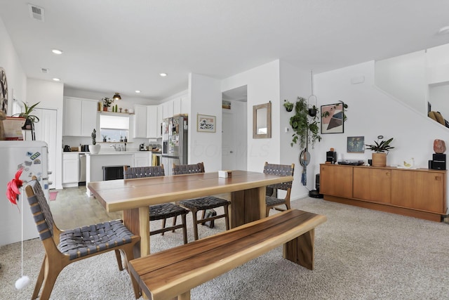 dining area featuring visible vents and recessed lighting