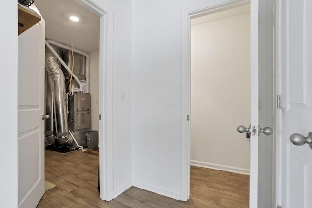 spacious closet with wood finished floors