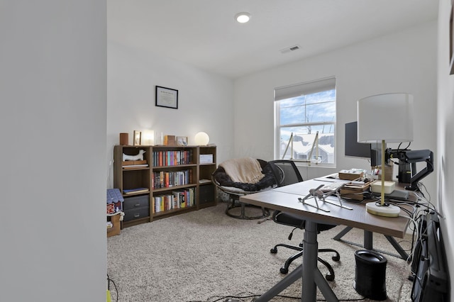 carpeted office featuring visible vents