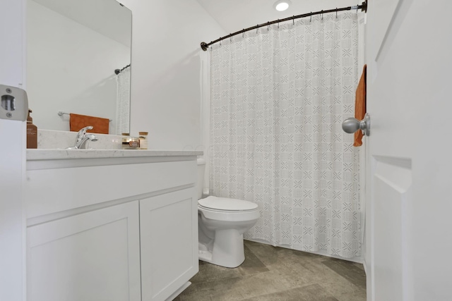 full bathroom featuring vanity and toilet