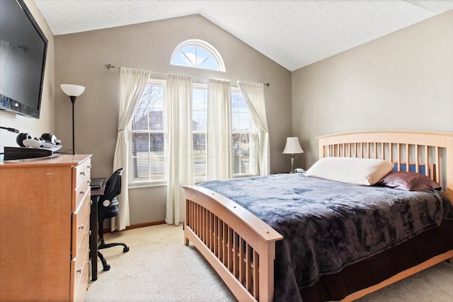 bedroom with lofted ceiling, light carpet, a textured ceiling, and baseboards