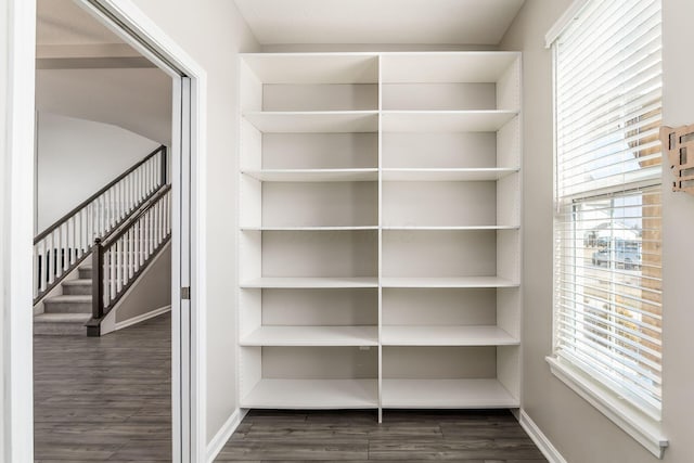 interior space with dark wood-type flooring