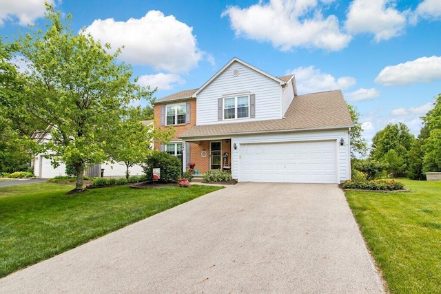 traditional home with a garage, brick siding, driveway, and a front lawn