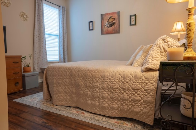 bedroom with wood finished floors