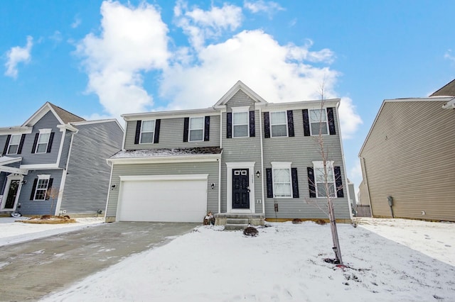 view of front of house featuring an attached garage and concrete driveway