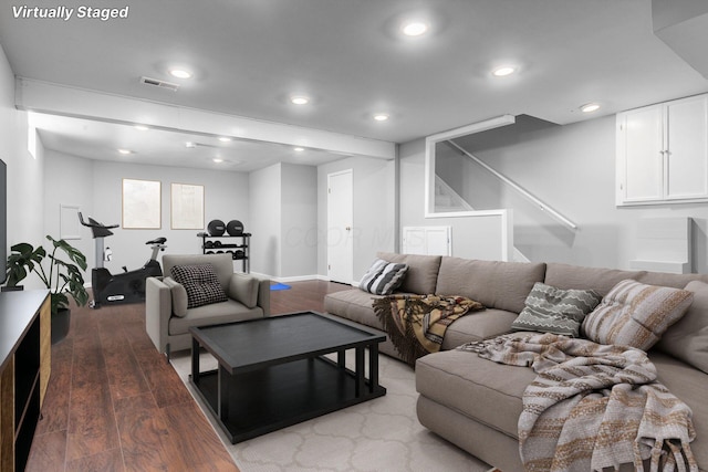 living area featuring visible vents, wood finished floors, and recessed lighting