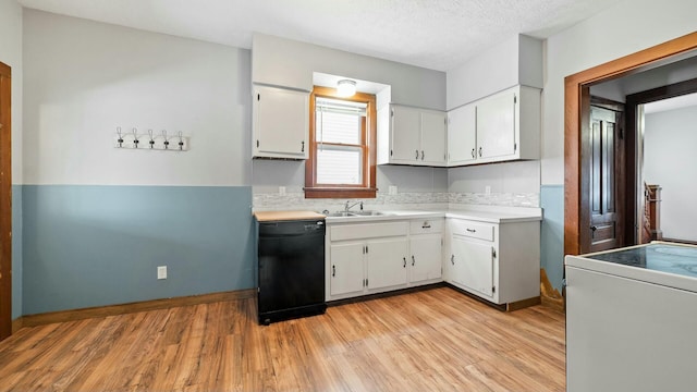 kitchen featuring stove, a sink, white cabinetry, black dishwasher, and light countertops