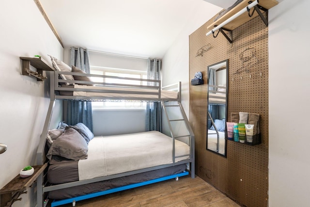 bedroom featuring wood finished floors