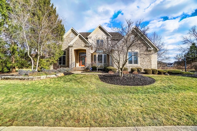 view of front of home featuring stone siding and a front lawn