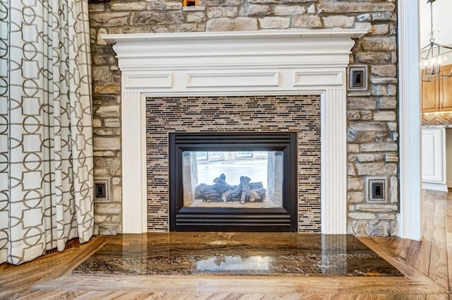 interior details featuring a multi sided fireplace