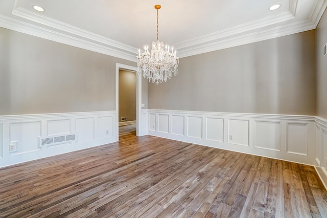 unfurnished room with light wood-type flooring, visible vents, a chandelier, and recessed lighting