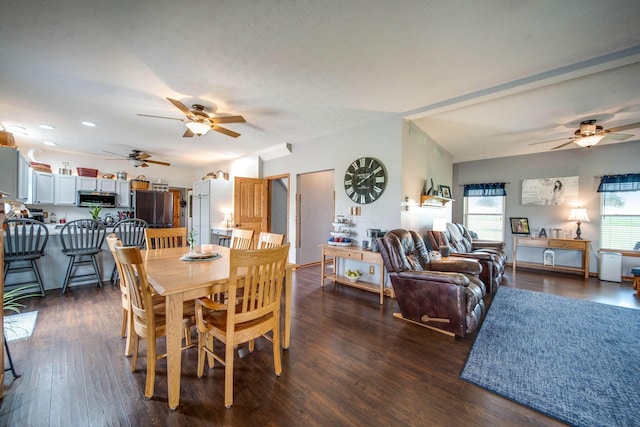 dining space with dark wood-style floors