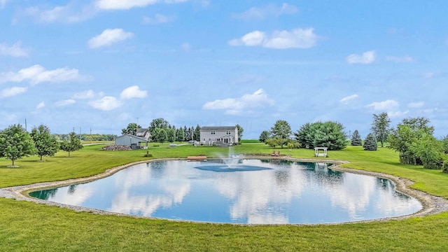 exterior space featuring a water view and a yard