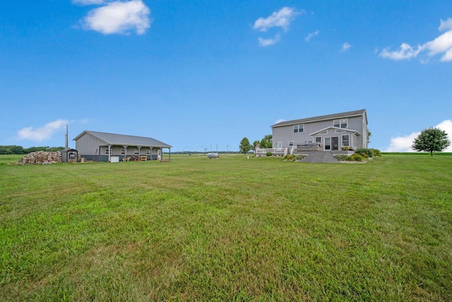 view of yard with a rural view