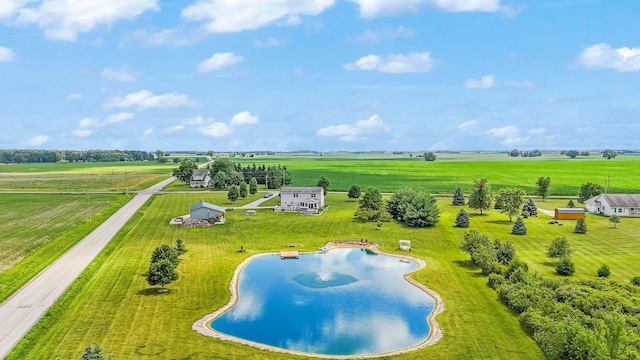 birds eye view of property with a rural view